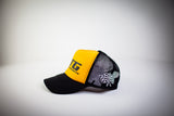 RTG MOTORSPORTS '23 TRUCKER HAT (BLACK/GOLD)